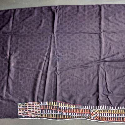 Indigo-dyed cotton wraparound with typical colourful embroideries. Dim. 98 x 151 cm. Bororo-Fulani, Niger.